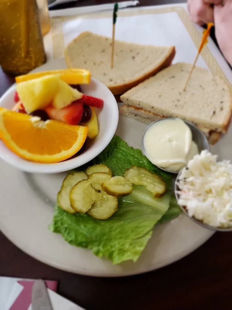 Gobbler Sandwich with Coleslaw and Fresh Fruit